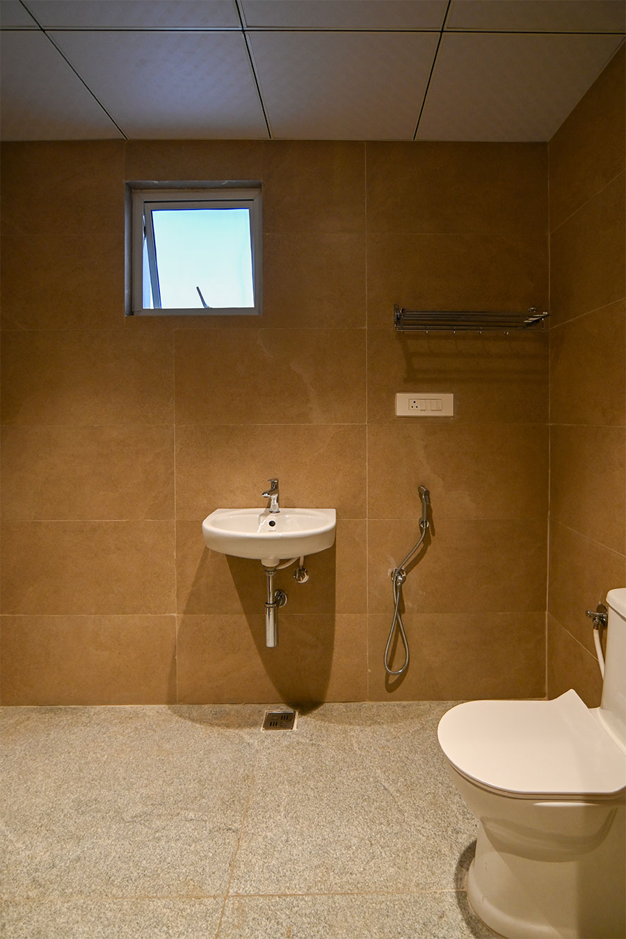 Clean modern restrooms with marble tiles