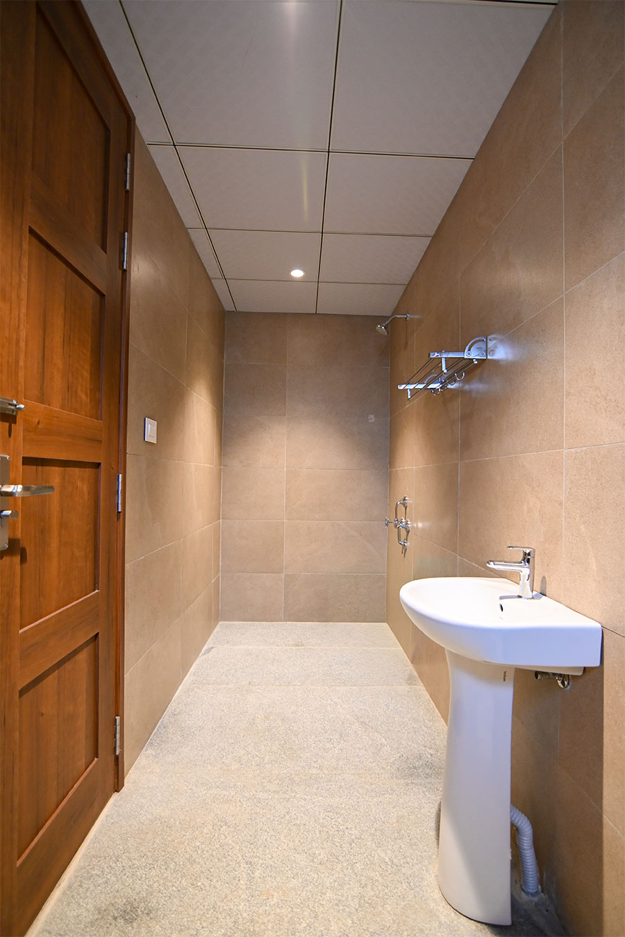 Clean modern restrooms with marble tiles